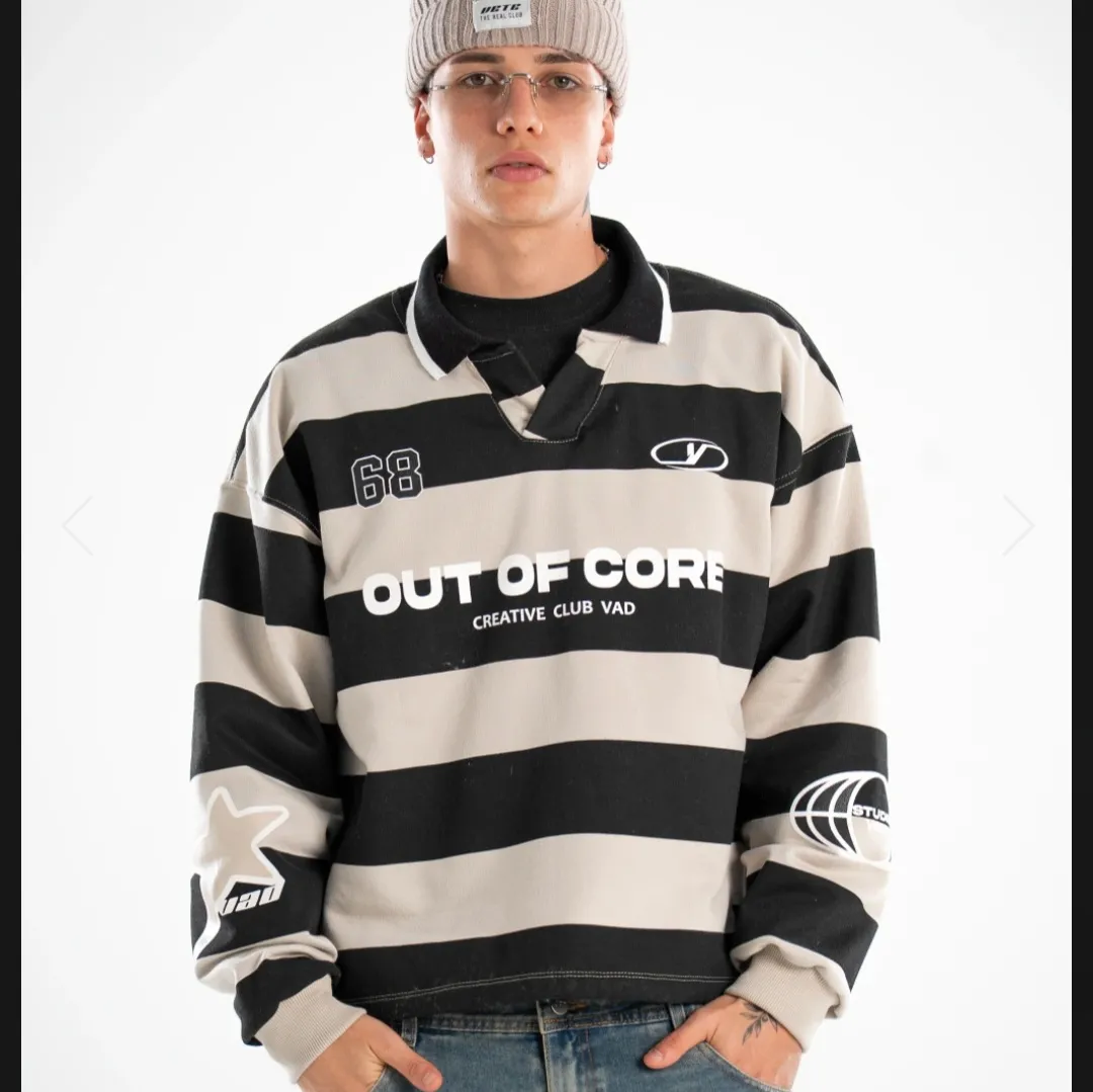 buzo chomba frisa negro/beige